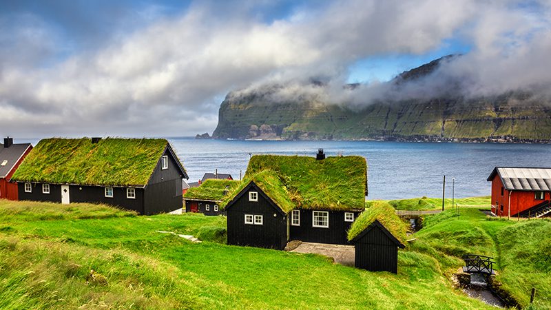 Traditional Faroese homes with turf roofs