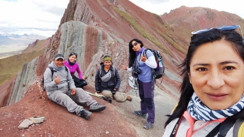 A group of trekkers on a mountain in peru