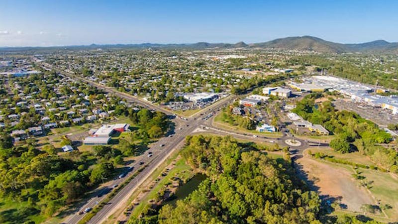 Aerial view of the town of Rockhampton on a clear, sunny day.