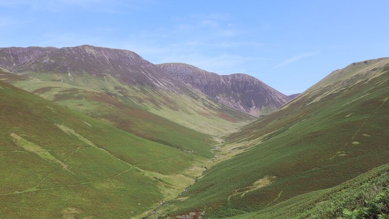 The green rolling hills of the Lake District in England.