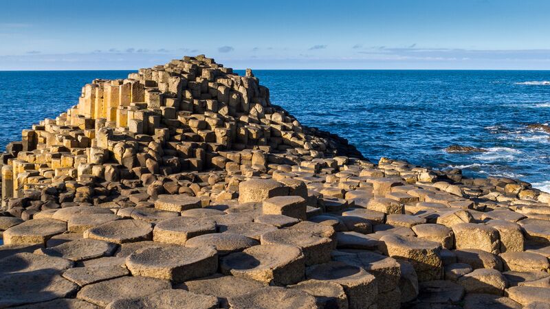 The giant stepping stones near the ocean known as the Giants Causeway, Ireland. 
