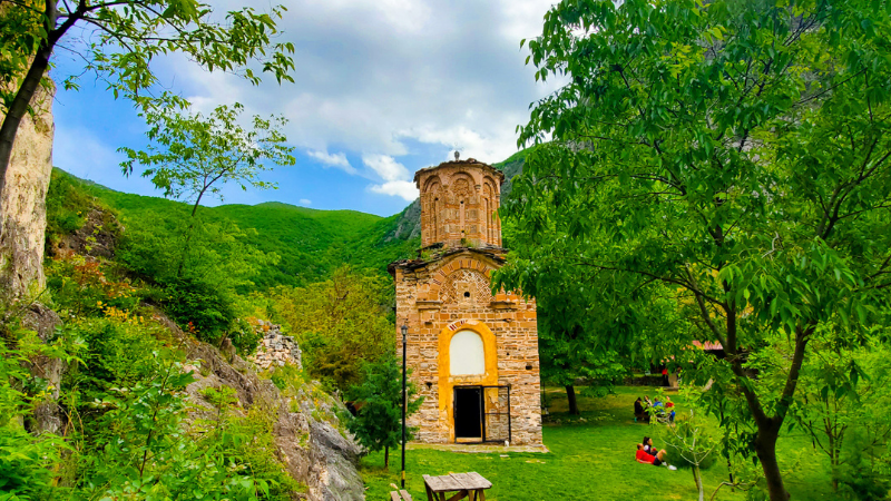 An old church surrounded by trees