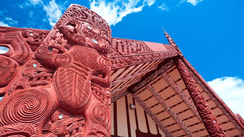 The intricately detailed structure of a Maori monument.