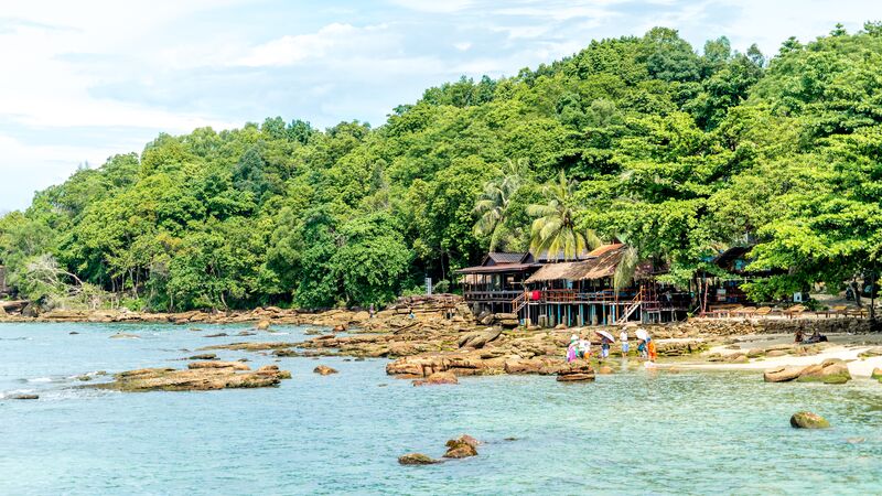 The island of Sihanoukeville with its rocky coastline and dense jungle.