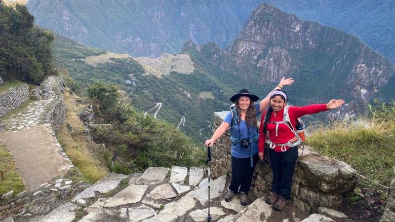 Two travellers on a hiking trail in Peru