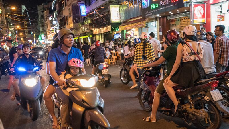 A busy street filled with motorbikes in Ho Chi Minh, Vietnam