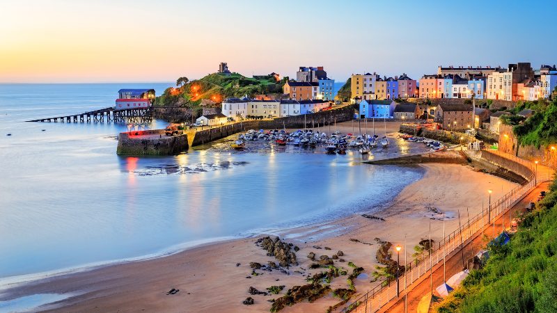 The colourful shoreline city of Tenby at twilight.