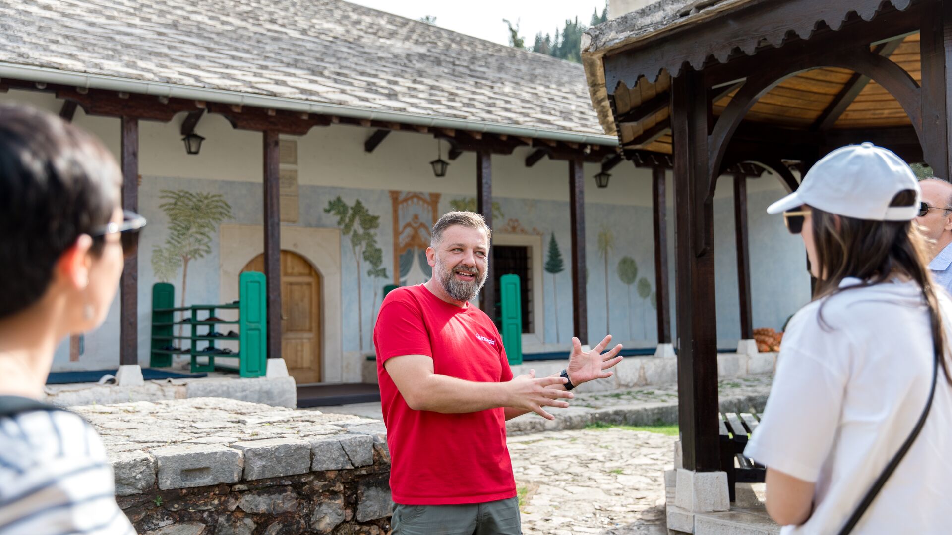 Local Intrepid leader Muhamed in his element talking to travellers