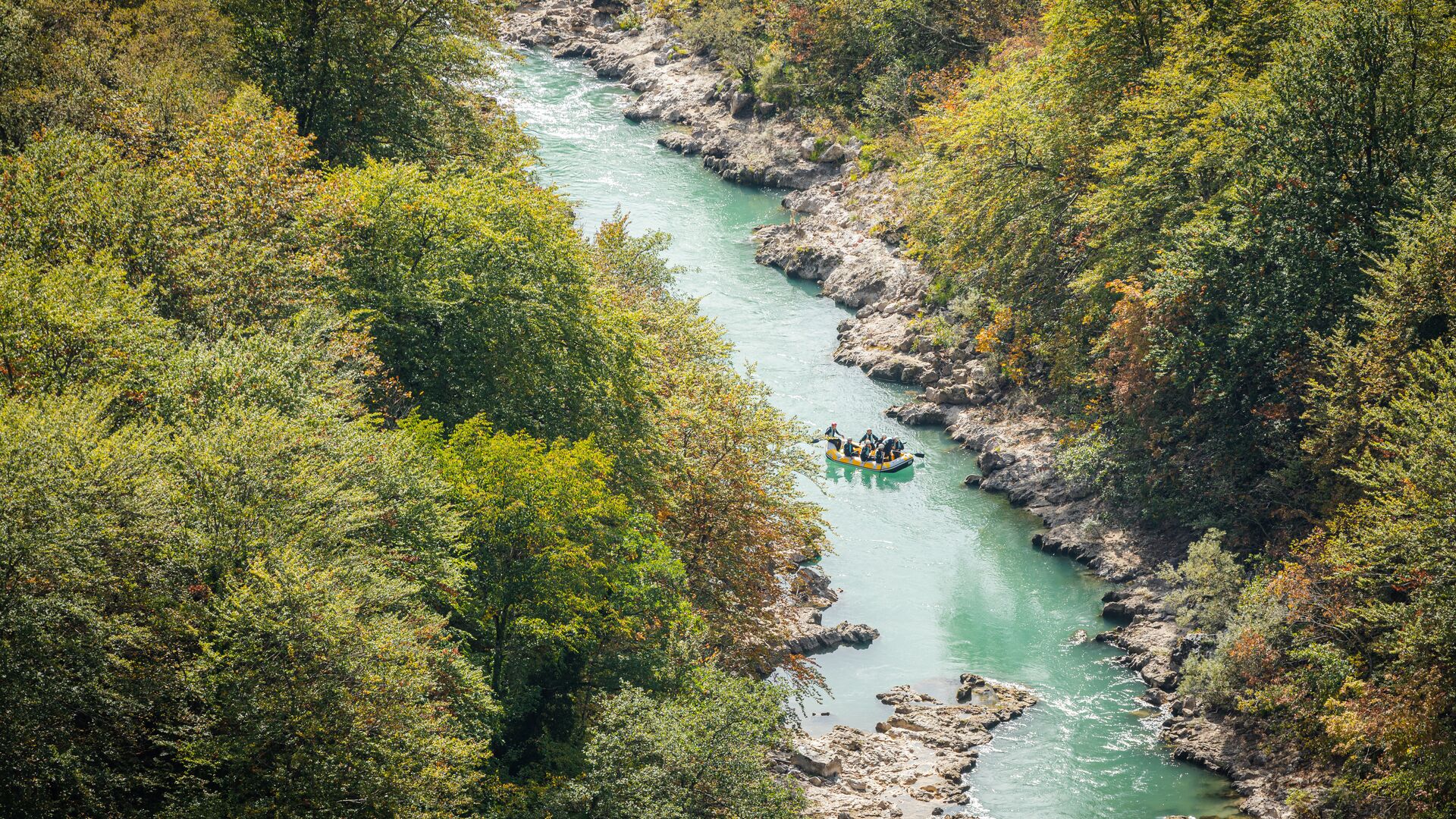 People white water raft through Neretva River in Konjic