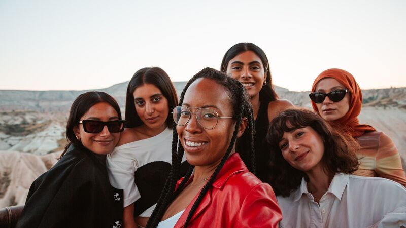 Six women pose for a selfie in Cappadocia, Turkey