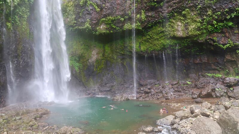 Splashing in the waterfall by Nabalesere Village, Fiji