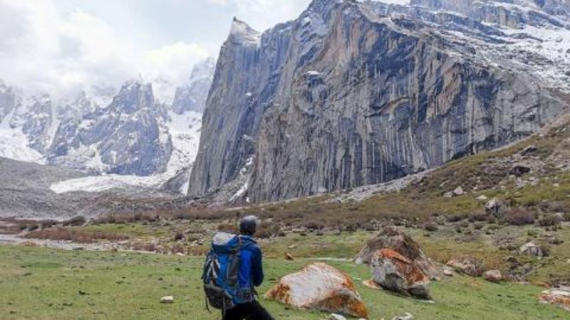 Traveller looking at the peaks of Nangma Valley in Pakistan. 