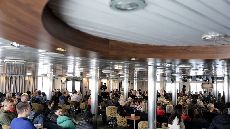 A packed room full of passengers on the Ocean Endeavour.
