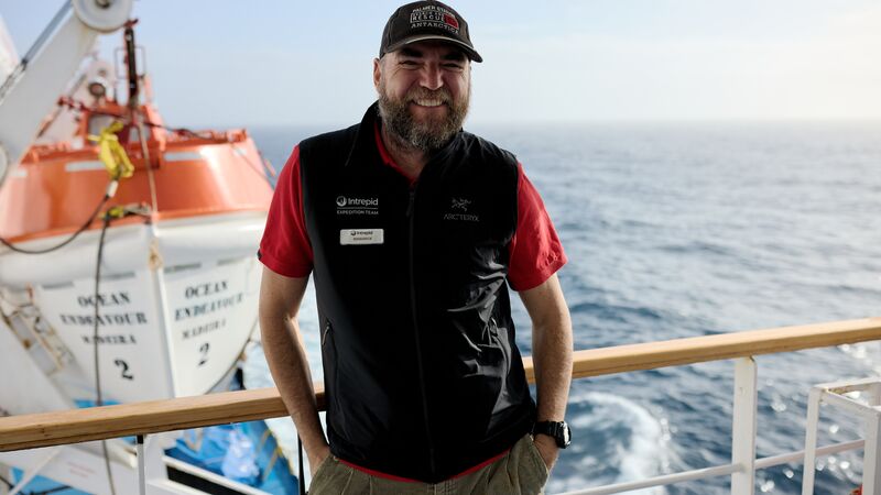 One of the Ocean Endeavour's expedition guides on the deck of the ship. 