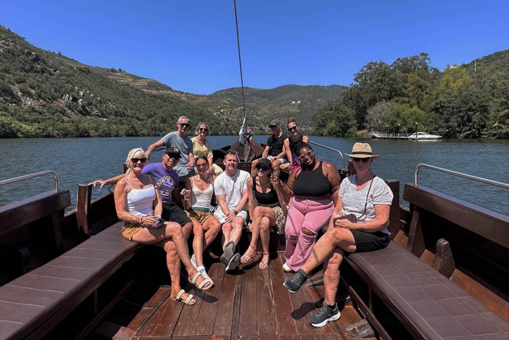 a group of travellers on a boat on lake