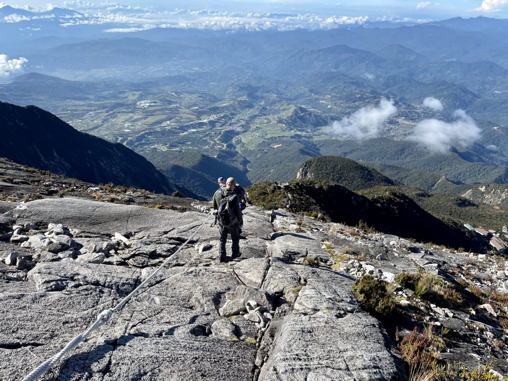 A hiker descending Mt Kinabalu