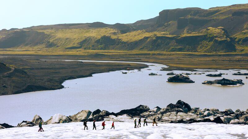 excursions to iceland A group walking across the Sólheimajökull Glacier