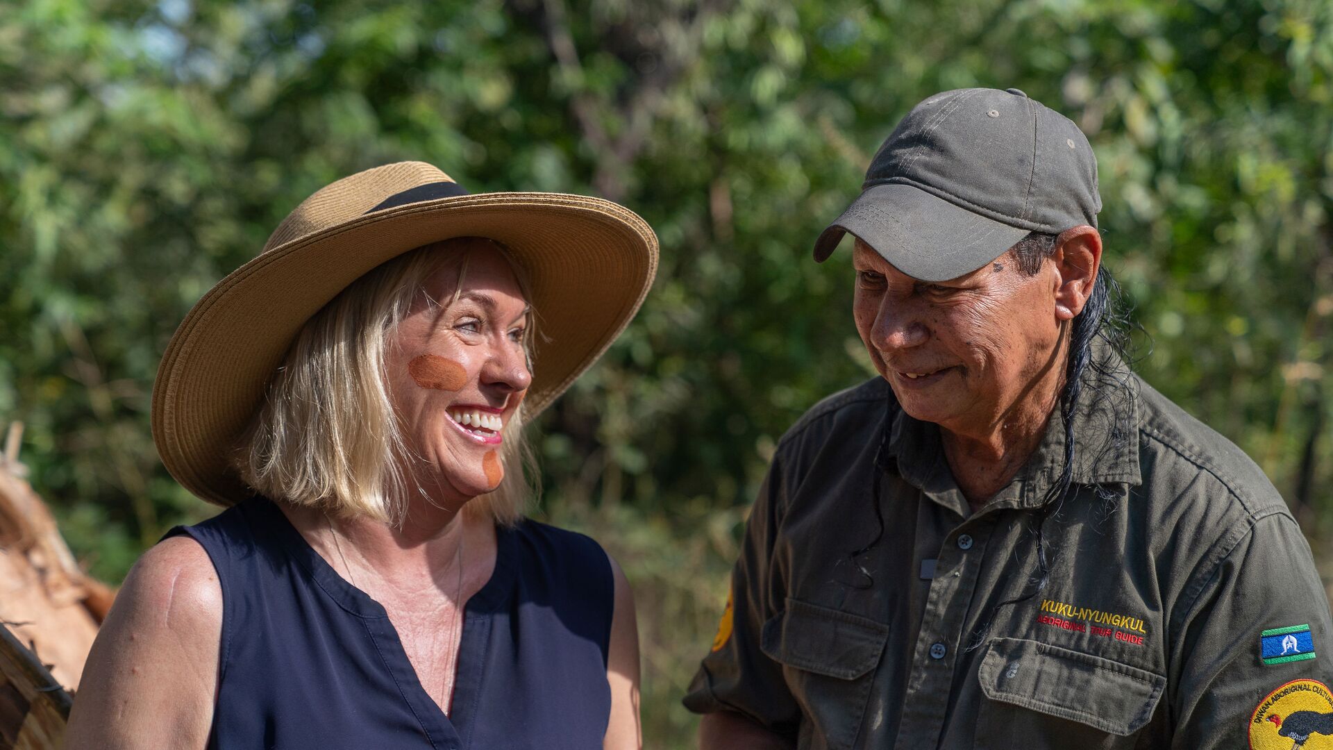 Susan and Mooks smile at each other after the smoking ceremony