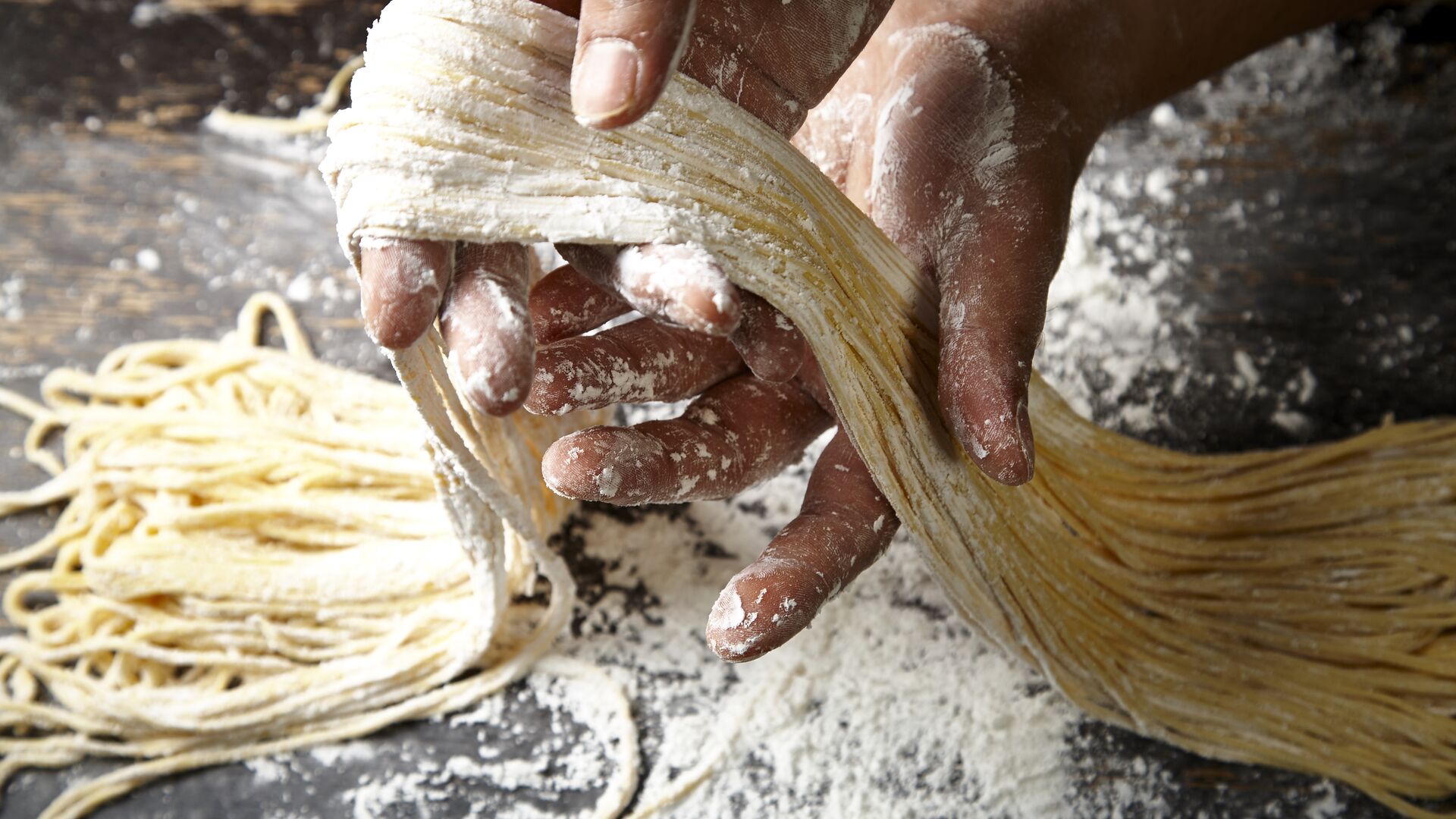 Hand-pulled noodles being made in China.