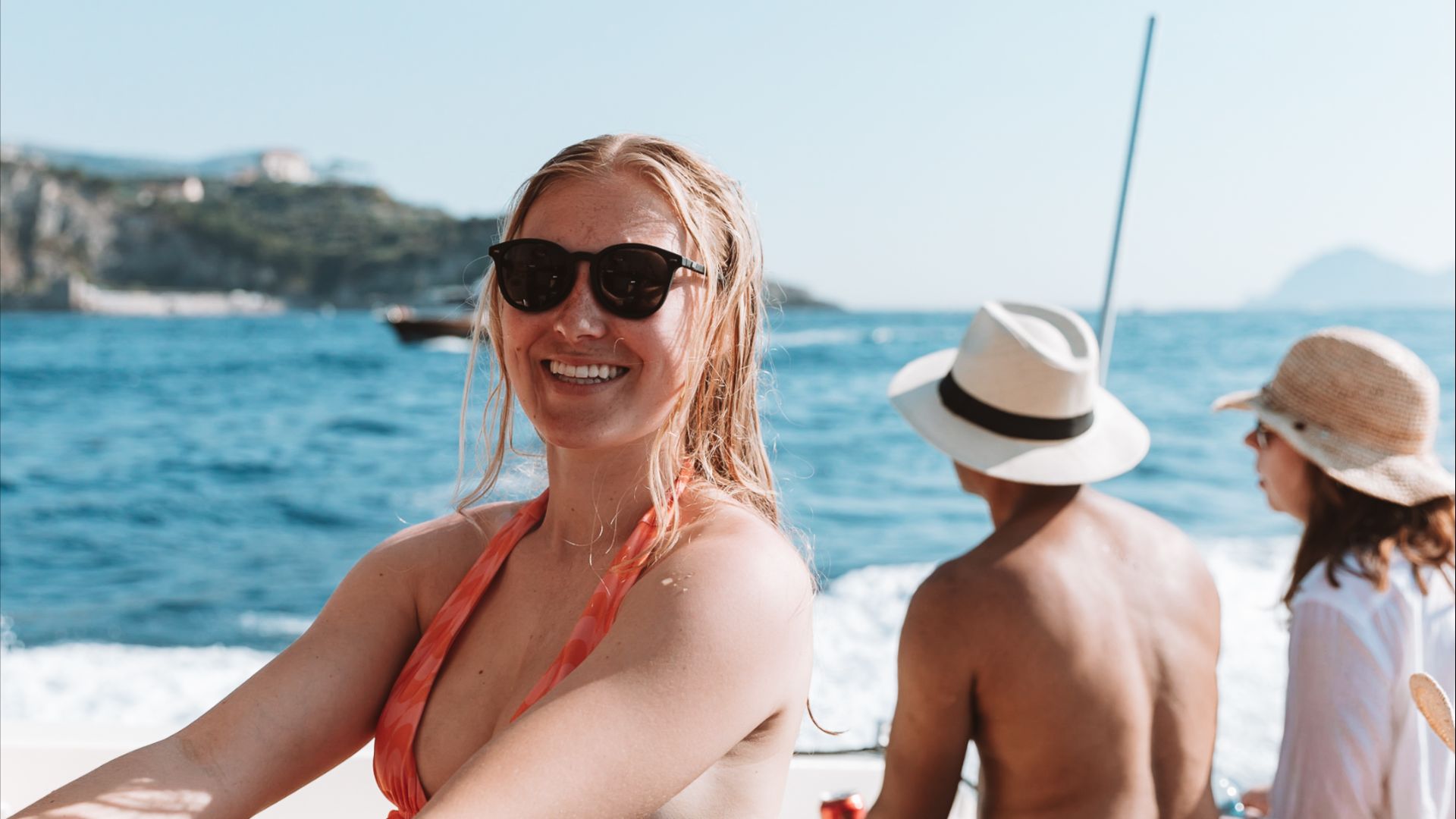A solo traveller on a Capri boat trip in Italy with Intrepid.
