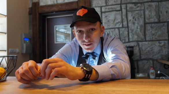Nemanja Jovic at the counter in Zvuci Srca, Belgrade, Serbia
