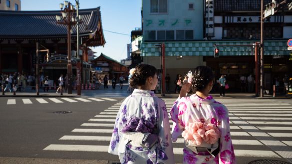 Geisha crossing the road in Tokyo, Japan.