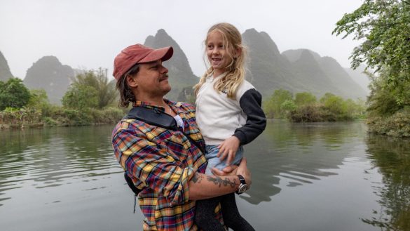 Mark Wilson, bassist of Jet, with his daughter.