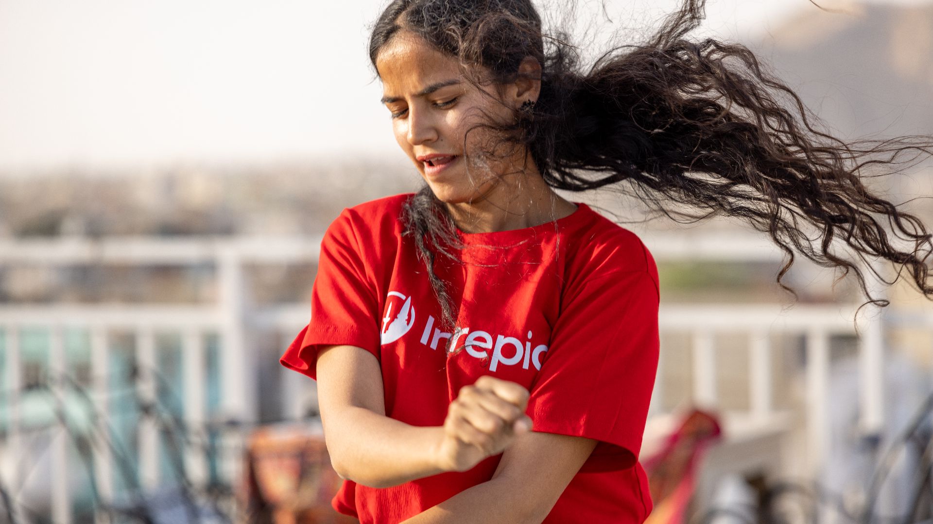 An Intrepid guide taking part in a Bollywood dance class in Jaipur.