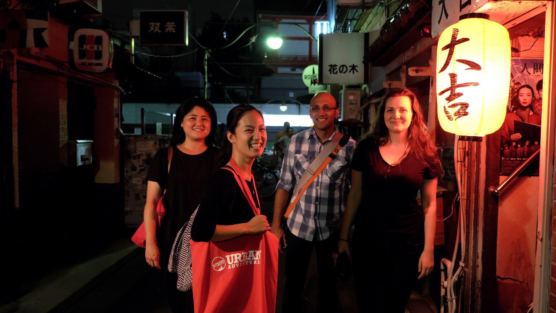 Exploring Tokyo's bars and alleyways with Intrepid Urban Adventures after dark.