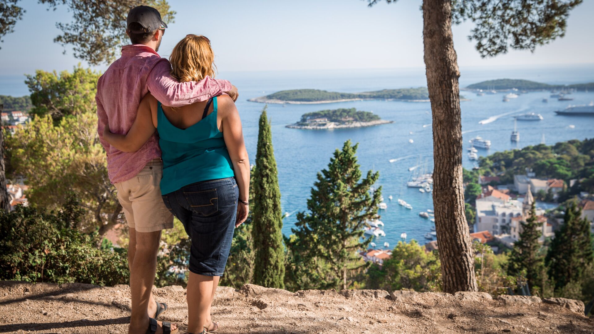 A couple admire the view of Croatia's islands