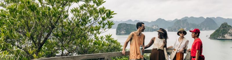 Travellers in Vietnam looking over HaLong Bay