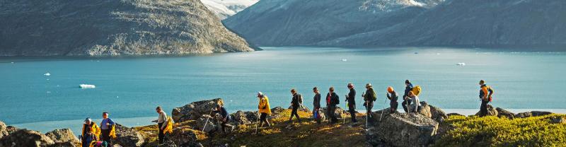Travellers hiking in Greenland