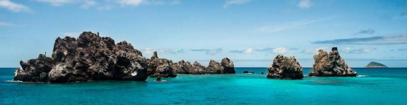 Rocky landscape and blue waters of Galapagos Islands