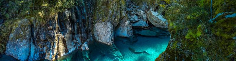 glowing blue waters in a crevasse on the South Island of New Zealand