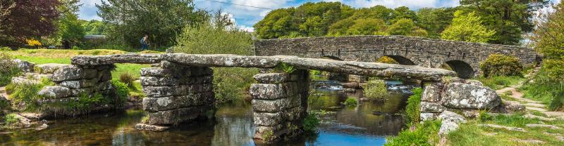 A stone bridge over the River Dart in Devon