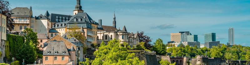 Some of the medievel buildings in the Old Town of Luxembourg on a clear day. 