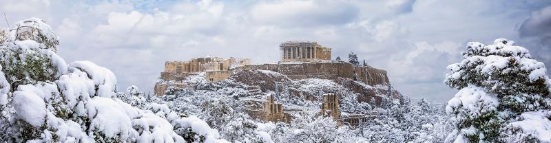 The Pantheon Temple covered in a fresh layer of white snow.