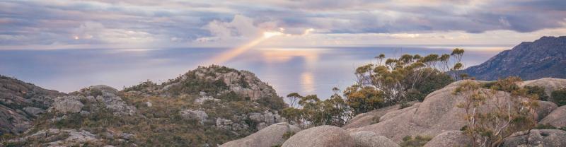 The rugged landscape of Freycinet National Park in Tasmania at sunset 