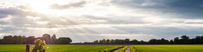 A scenic view of the Suffolk countryside on a cloudy day