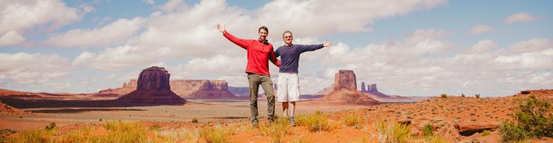 Two travelers posing for a picture in Monument Valley, Arizona
