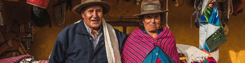 A local couple selling colourful Peruvian textiles on the Great Inca Road trail