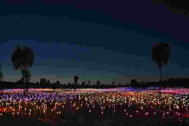 The colourful lights of the Field of Light installation near Uluru
