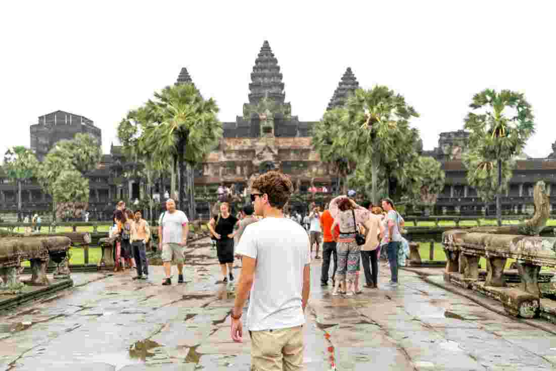 Male traveller at Angkor Wat in Cambodia 
