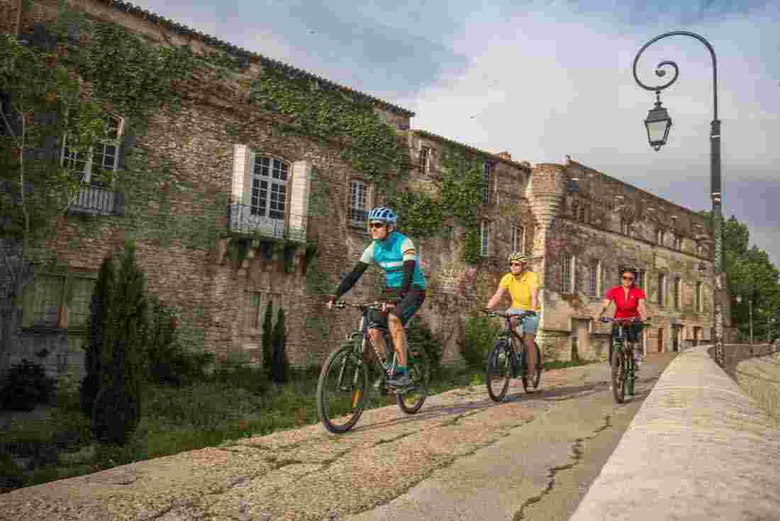 Cycle tour group in Arles, France