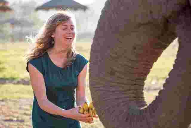 Woman with an elephant in Thailand