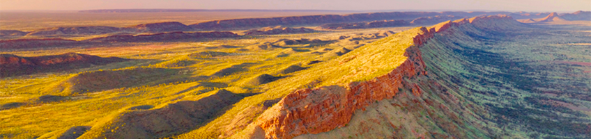 Aerial view of the Larapinta Trek in the Northern Territory at sunset. 