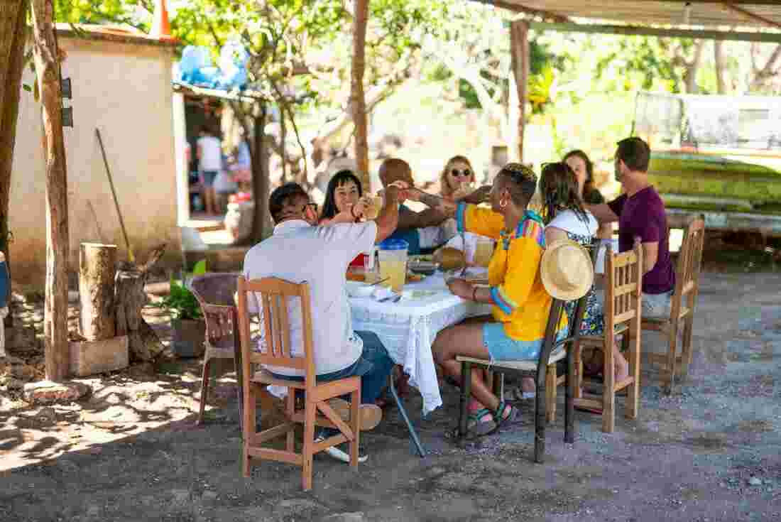 Eating home cooking around a table in Mexico
