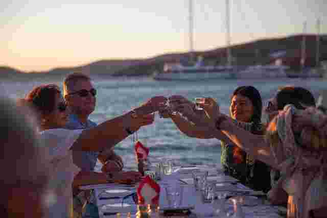 Raising a glass of ouzo to toast to new friendships