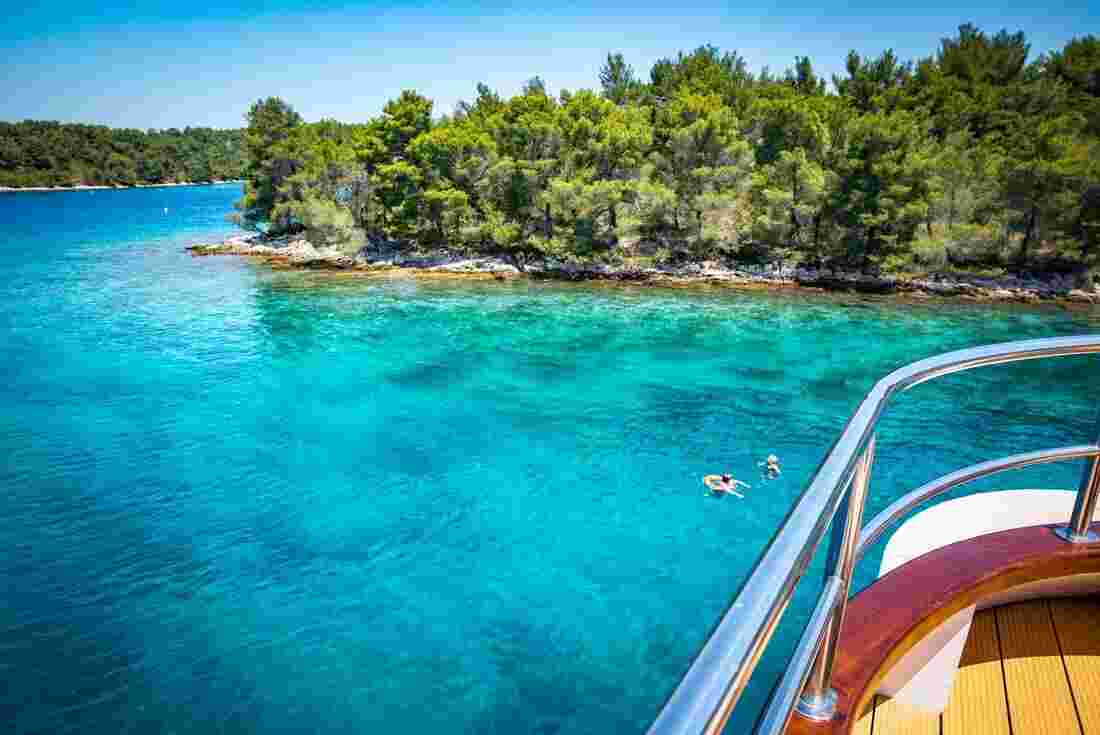 Swimming in the crystal blue water on a Croatian boat tour