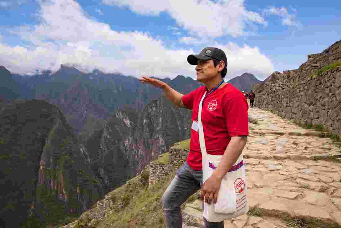 An Intrepid local leader on Machu Picchu, Peru
